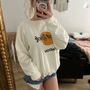 Hard Rock Cafe Cream Sweatshirt with Orange Logo